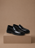 Penny loafers heren in zwart met leerlook – Estrani